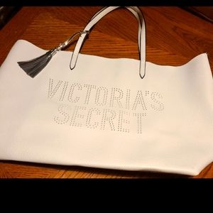 Victoria's secret white tote bag Silver inside Silver tassel outside on strap